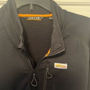 Orvis black pullover, size xxl, half zip with zippered chest pocket.